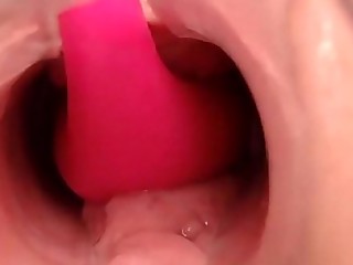 Sexy girls uses speculum and vibrator